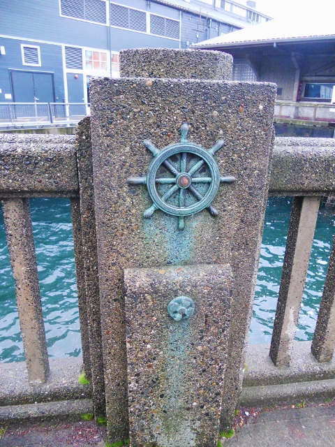 Ship's wheel architectural detail, Seattle (near the aquarium)